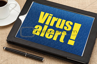 virus alert on digital tablet