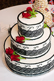 Three Tiered Rose Covered Wedding Cake 