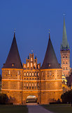 Holstein gate and Petri church by night in Lubeck