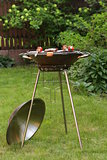 round metal  barbecue grill appliance  picnic outdoors