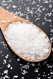 Sea salt in wooden spoon