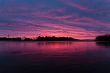 Sundown over a lake with red sky