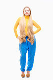 Young Woman with Long Blond Hair, Yellow Dress and Large Blue Eg