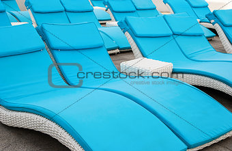 empty beach couches at the beach