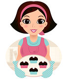 Young baking woman holding cookies