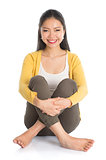 Asian woman full body seated