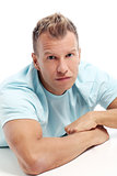 Adult man with a shirt posing in studio