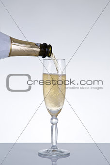 Champagne pouring into a glass  