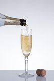 Champagne pouring into an elegant glass 