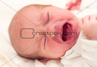 crying newborn baby in the hospital