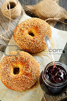 Bagels and jam in a jar.