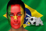 Cameroon football fan in face paint