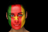 Cameroon football fan in face paint