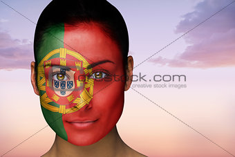 Beautiful brunette in portugal facepaint