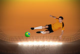 Football player in orange jumping
