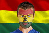 Serious young ghana fan with facepaint