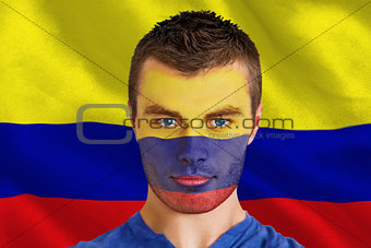 Serious young colombia fan with facepaint