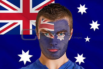 Serious young australia fan with facepaint