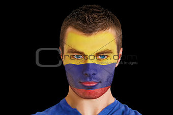 Serious young colombia fan with facepaint