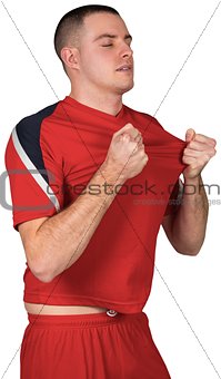 Excited football player cheering