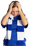 Disappointed football fan looking down