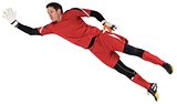 Fit goal keeper jumping up