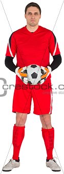 Fit goal keeper looking at camera