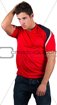 Disappointed football fan in red