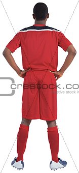 Football player in red standing