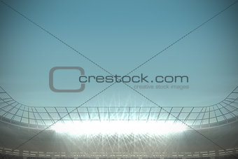 Large football stadium under blue sky