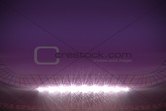 Large football stadium under purple sky