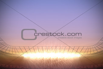 Large football stadium under purple sky