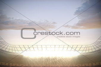 Large football stadium under cloudy blue sky