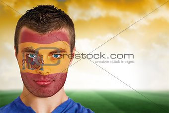 Spain football fan in face paint