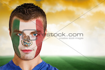 Mexico football fan in face paint