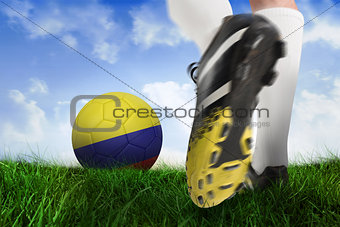 Football boot kicking colombia ball
