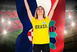 Excited football fan in brasil tshirt holding croatia flag