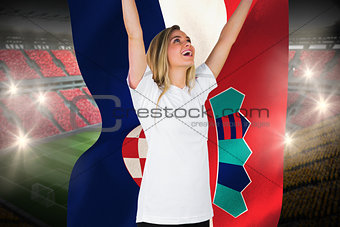 Pretty football fan in white cheering holding croatia flag