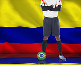 Goalkeeper in white with ball