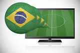 Football in brasil colours flying out of tv