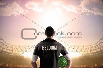Belgium football player holding ball