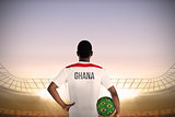 Ghana football player holding ball