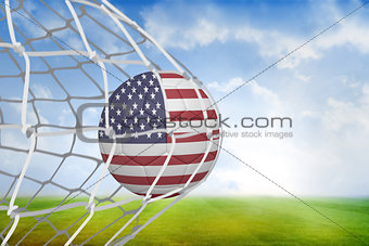 Football in america colours at back of net