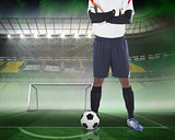 Goalkeeper standing with ball