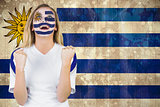 Excited fan in uruguay face paint cheering