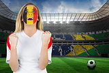 Excited belgium fan in face paint cheering