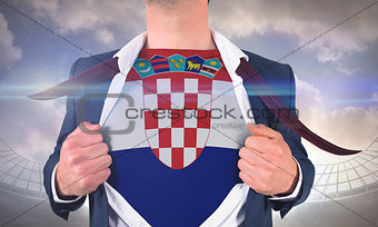 Businessman opening shirt to reveal croatia flag