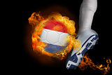 Football player kicking flaming netherlands ball