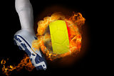 Football player kicking flaming belgium ball