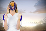 Excited bosnia fan in face paint cheering